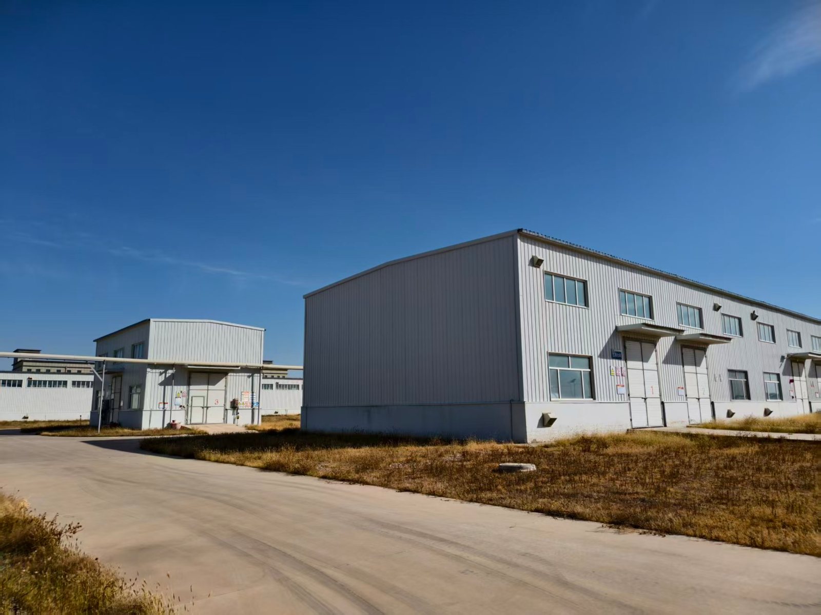 Joyantek production buildings seen from the plant road